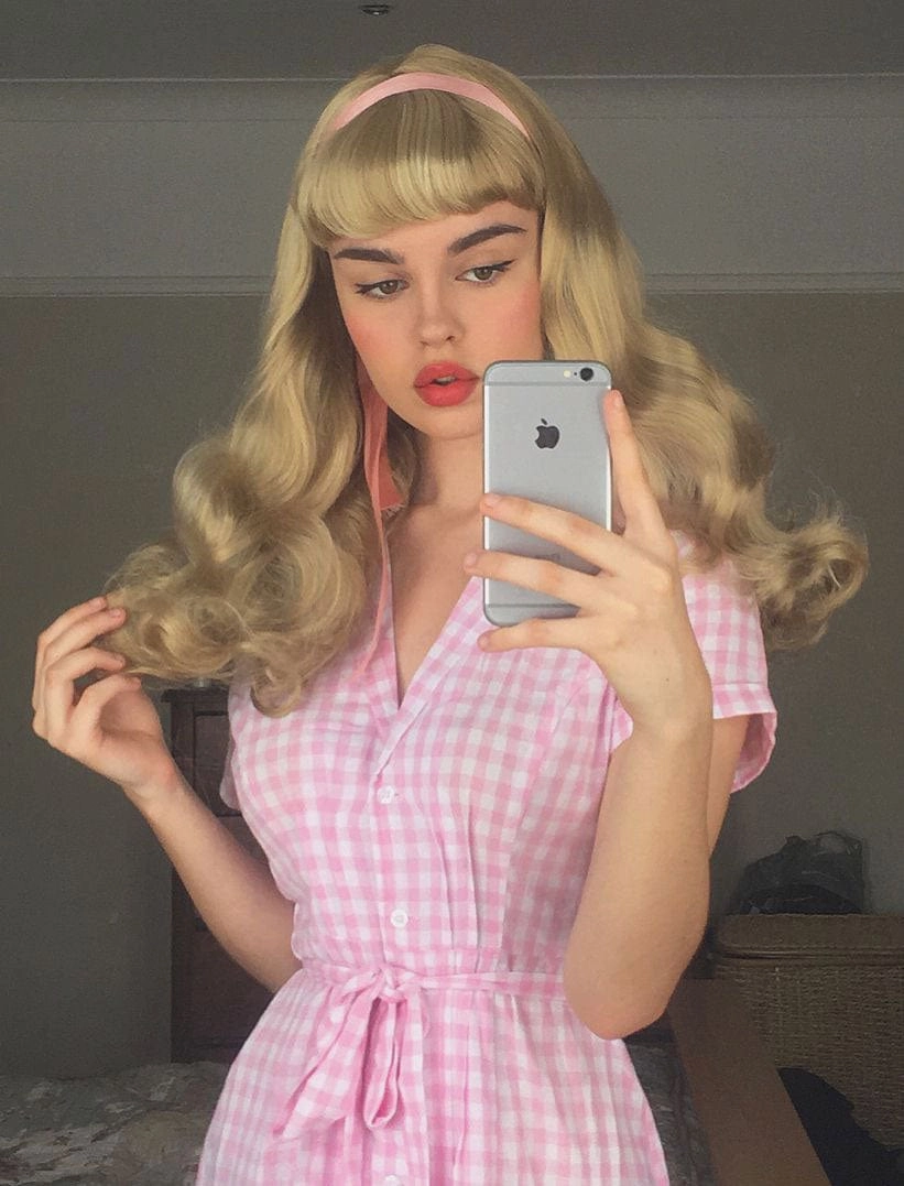 Long blonde 1950s style wig, gently wavy with short fringe: Emmeline